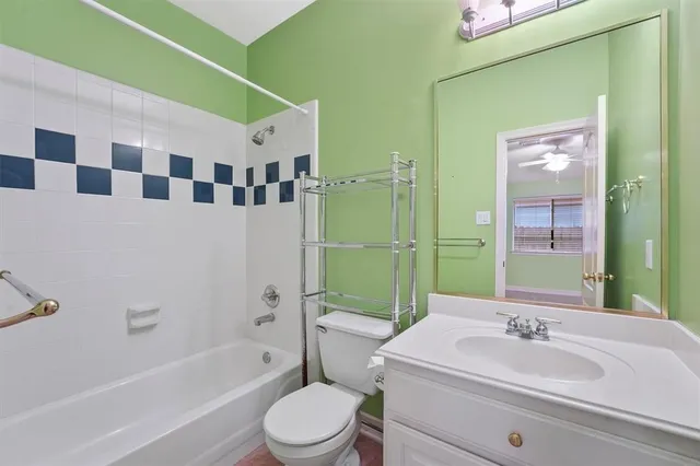 a bathroom with a sink a toilet and a bathtub