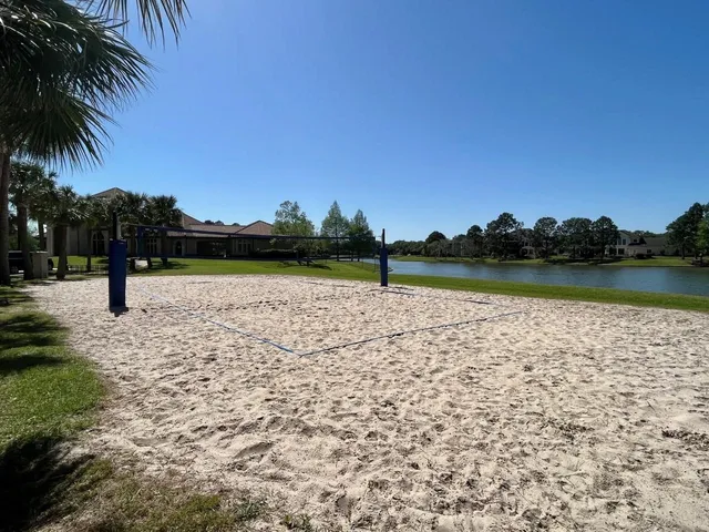 a view of a lake with a yard