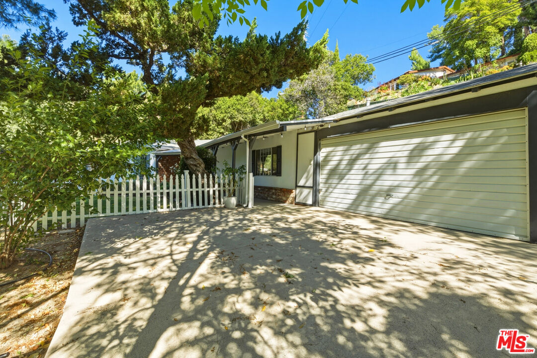 7815 Denivelle Road Sunland, CA 91040 - Photo 23 of 25 a view of a house with a large window