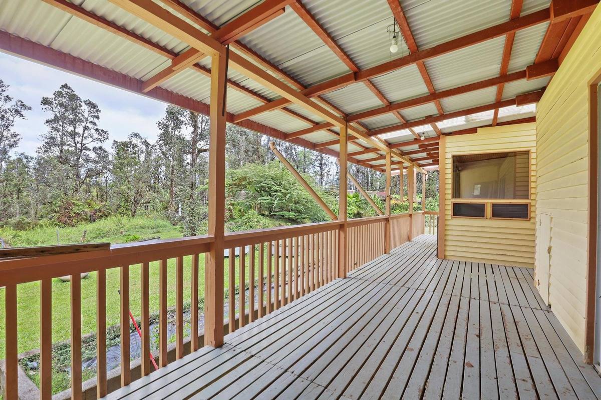 16-1585 Hopue Road, Unit 2 Mountain View, HI 96771 - Photo 5 of 29 a view of porch with wooden floor