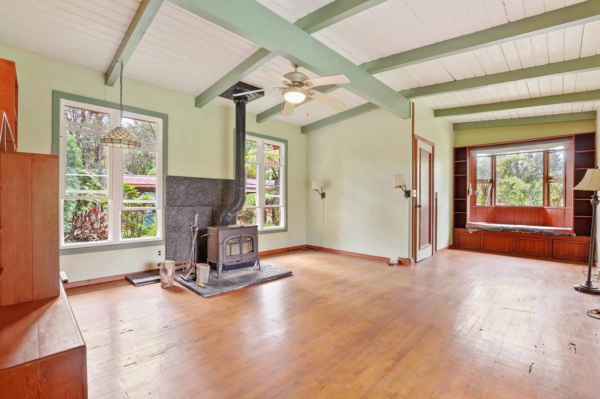 16-1585 Hopue Road, Unit 2 Mountain View, HI 96771 - Photo 7 of 29 an empty room with windows