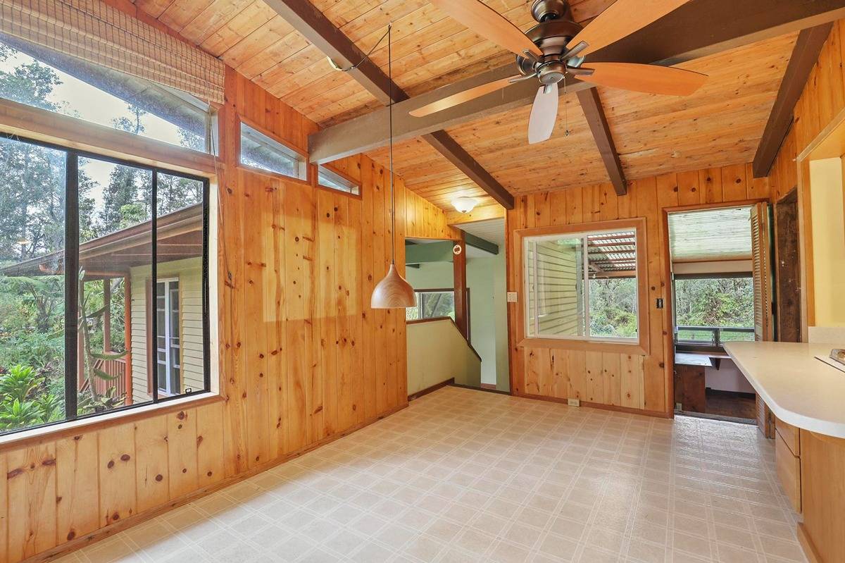 16-1585 Hopue Road, Unit 2 Mountain View, HI 96771 - Photo 10 of 29 a view of an empty room with a window