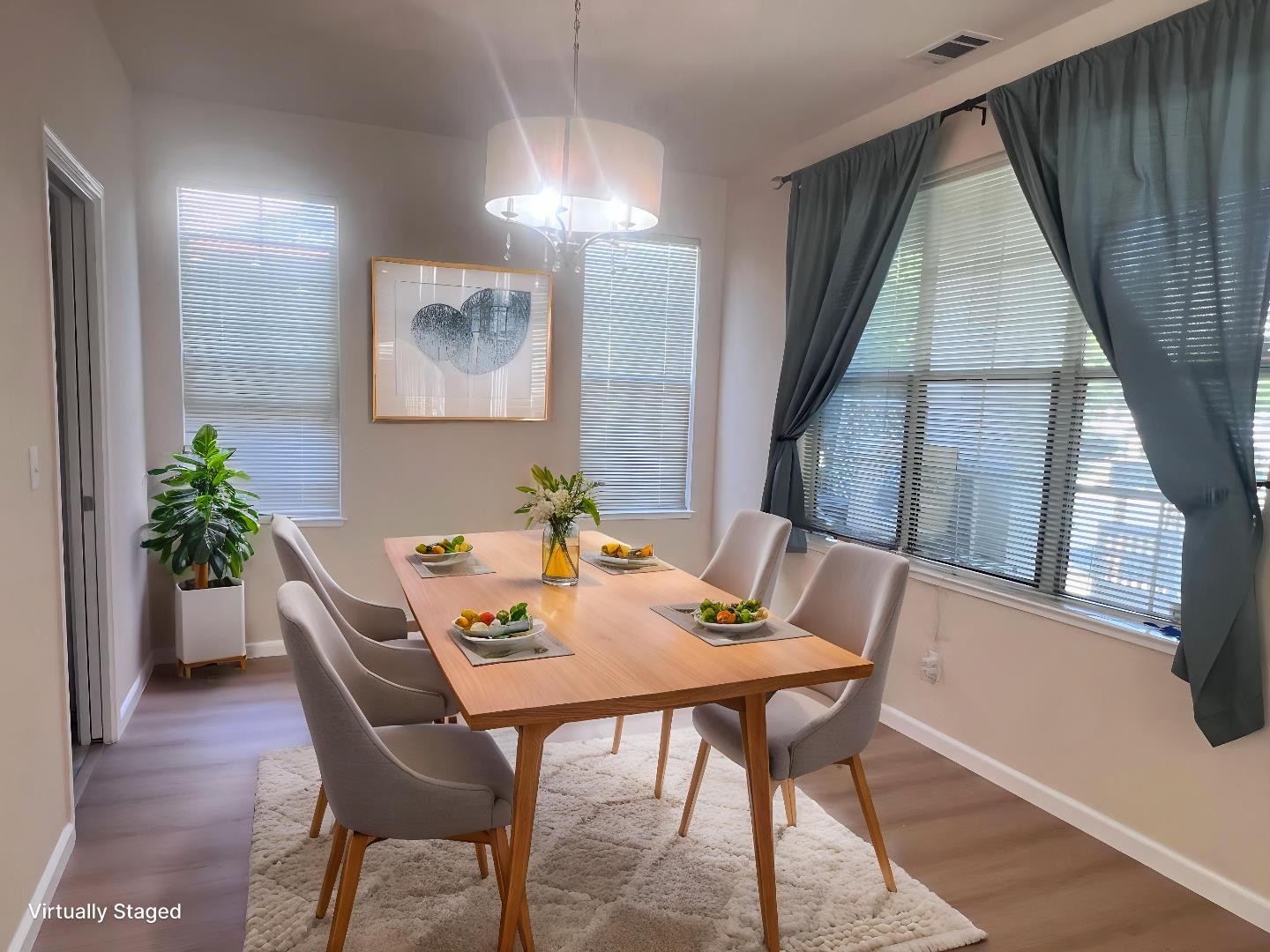 110 Whits Road Mountain View, CA 94040 - Photo 3 of 33 a view of a dining room with furniture window and wooden floor