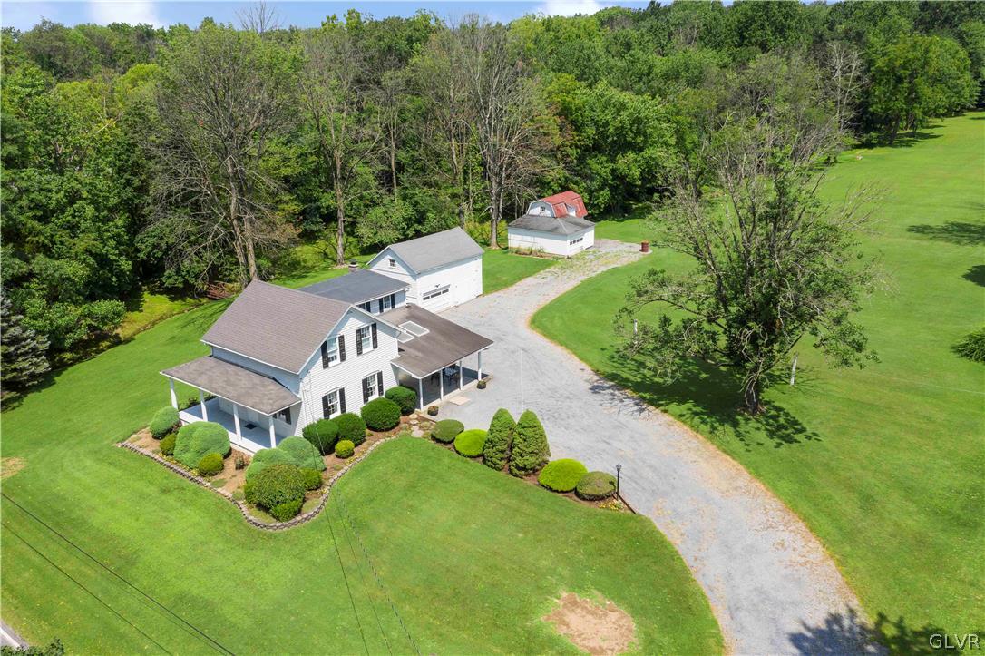 465 Belfast Road Nazareth, PA 18064 - Photo 2 of 32 an aerial view of a house with yard and green space