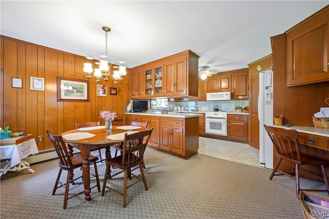 465 Belfast Road Nazareth, PA 18064 - Photo 5 of 32 a view of a dining room with furniture window and wooden floor