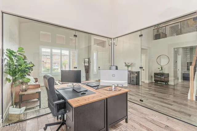 a kitchen with stainless steel appliances a refrigerator sink and cabinets
