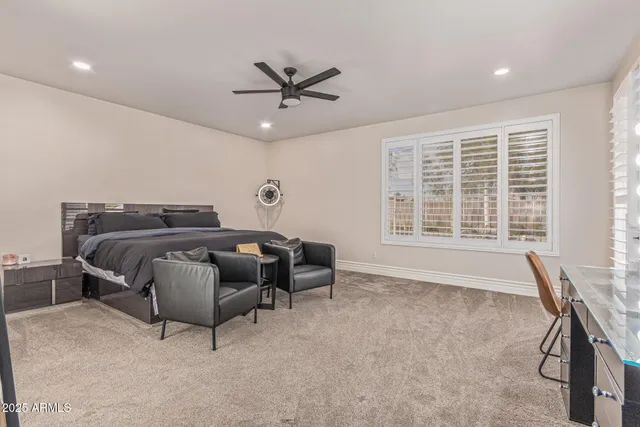 a living room with furniture and walk in closet
