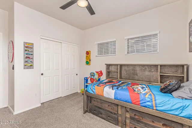 a view of a house with a yard porch and sitting area