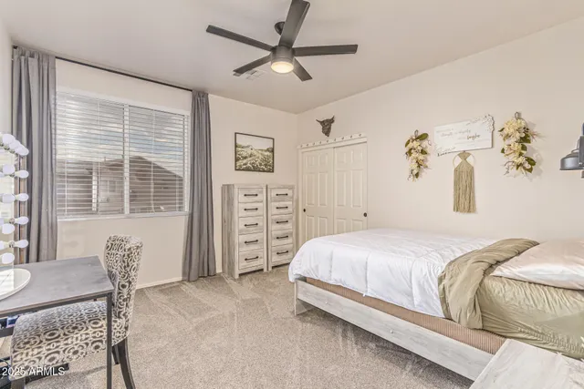 a view of a house with backyard porch and sitting area