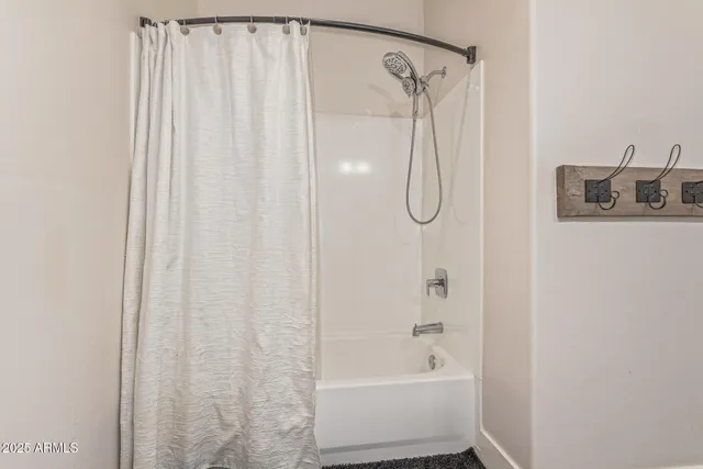 a view of a backyard with a garden and plants