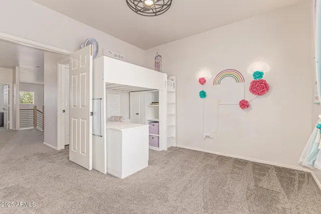 a view of a house with a big yard and a fountain