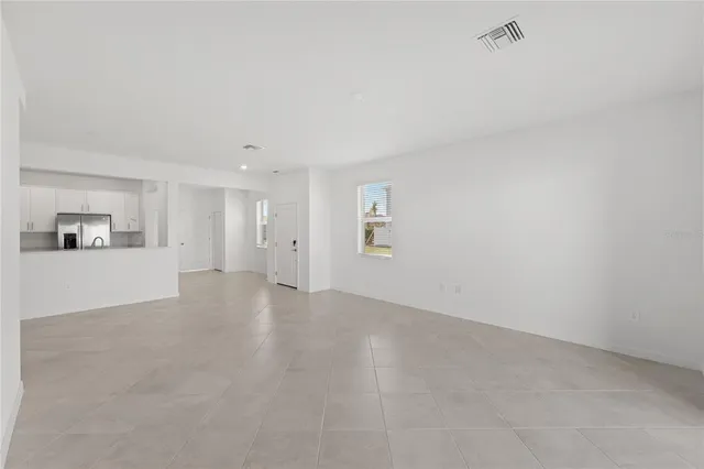 a bathroom with a granite countertop toilet a sink and a bathtub