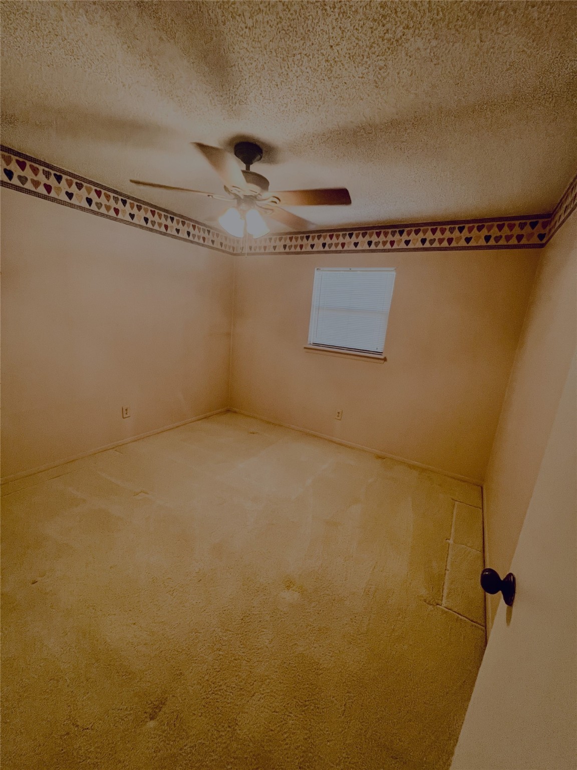 307 Jill Street Conroe, TX 77303 - Photo 15 of 20 a view of a room with wooden floor
