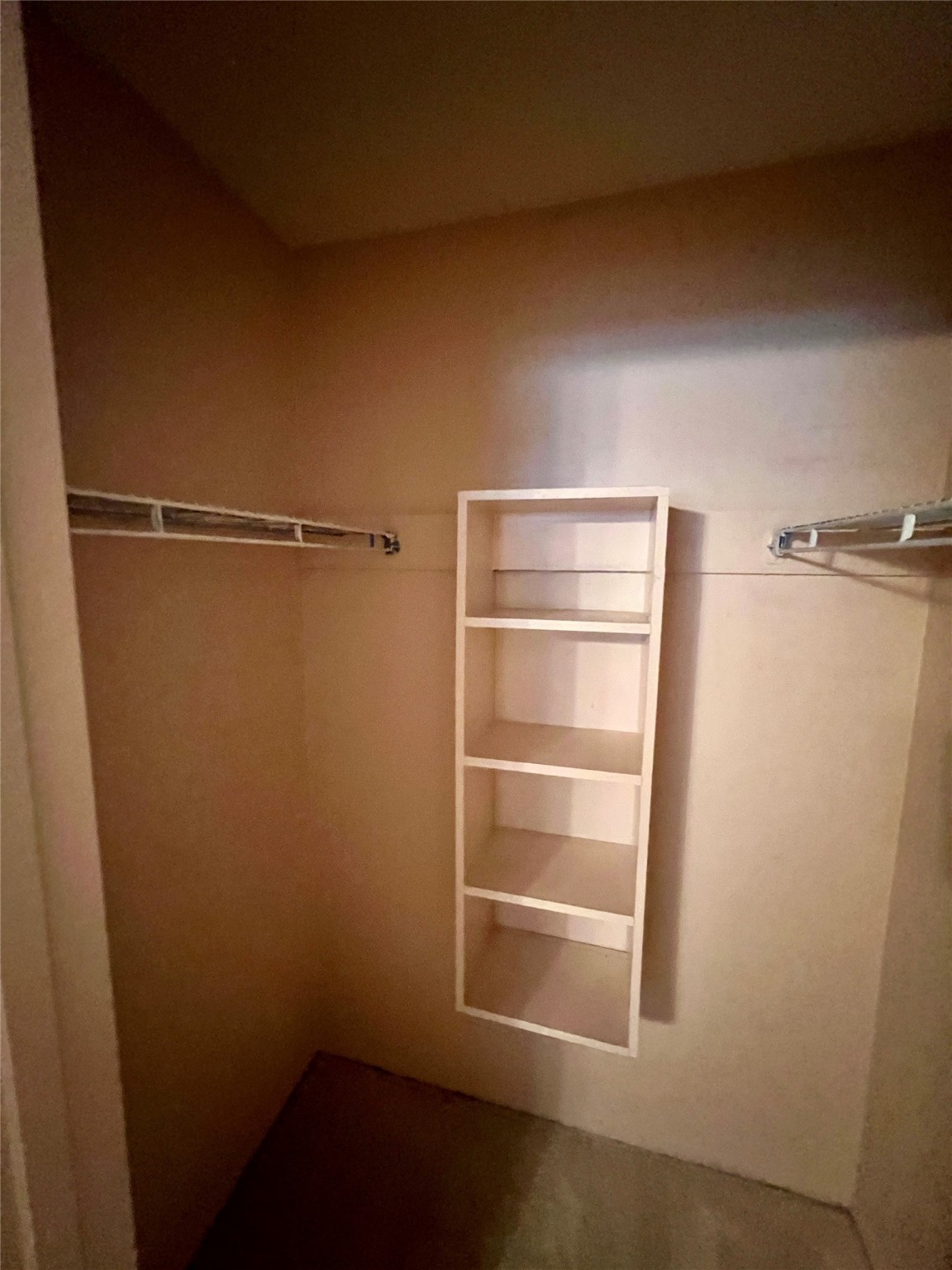 307 Jill Street Conroe, TX 77303 - Photo 16 of 20 a view of an empty walk in closet