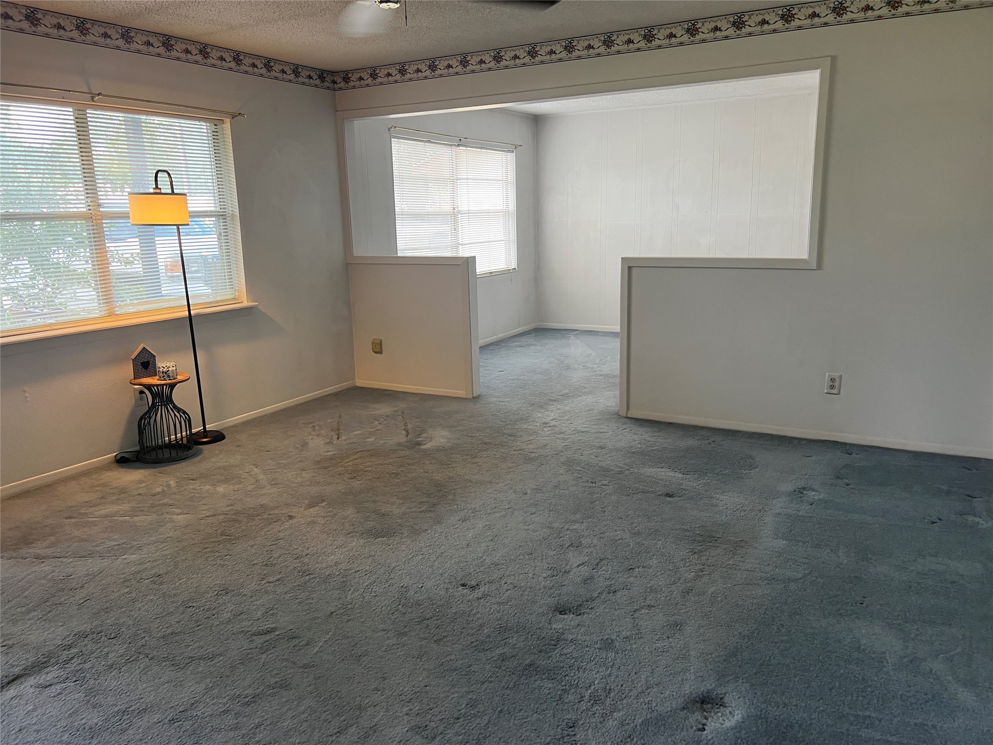 307 Jill Street Conroe, TX 77303 - Photo 2 of 20 an empty room with windows