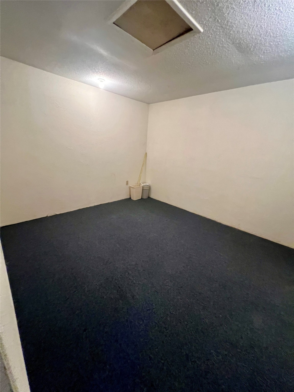 307 Jill Street Conroe, TX 77303 - Photo 6 of 20 a view of room and hallway