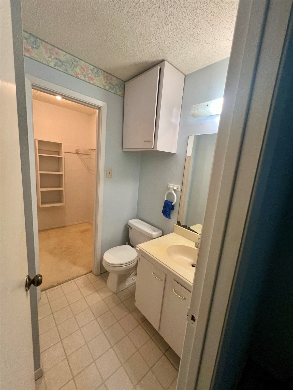 307 Jill Street Conroe, TX 77303 - Photo 10 of 20 a bathroom with a toilet sink and tub