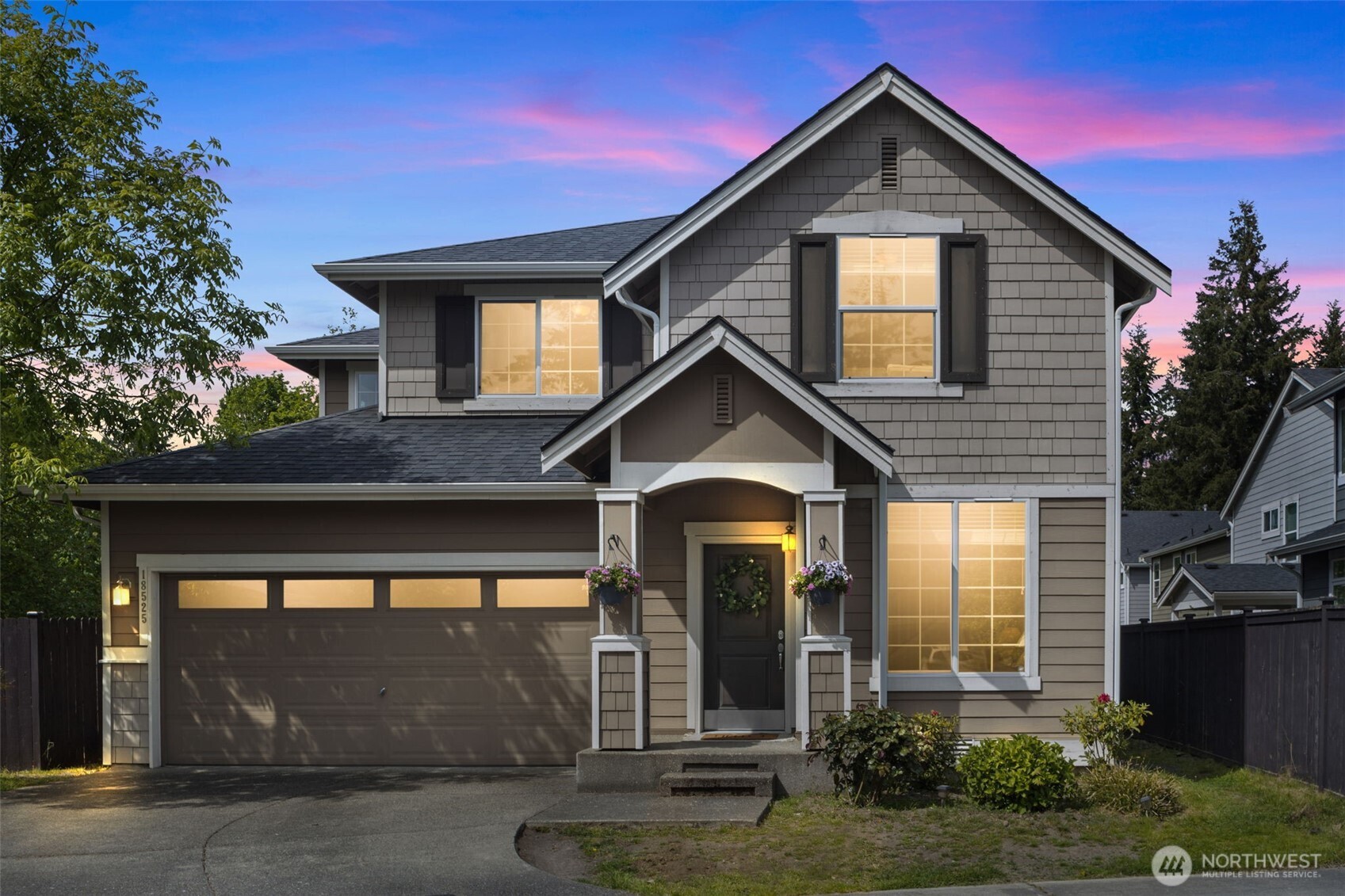 18525 115th Place Southeast Renton, WA 98055 - Photo 1 of 29 a front view of a house with a yard