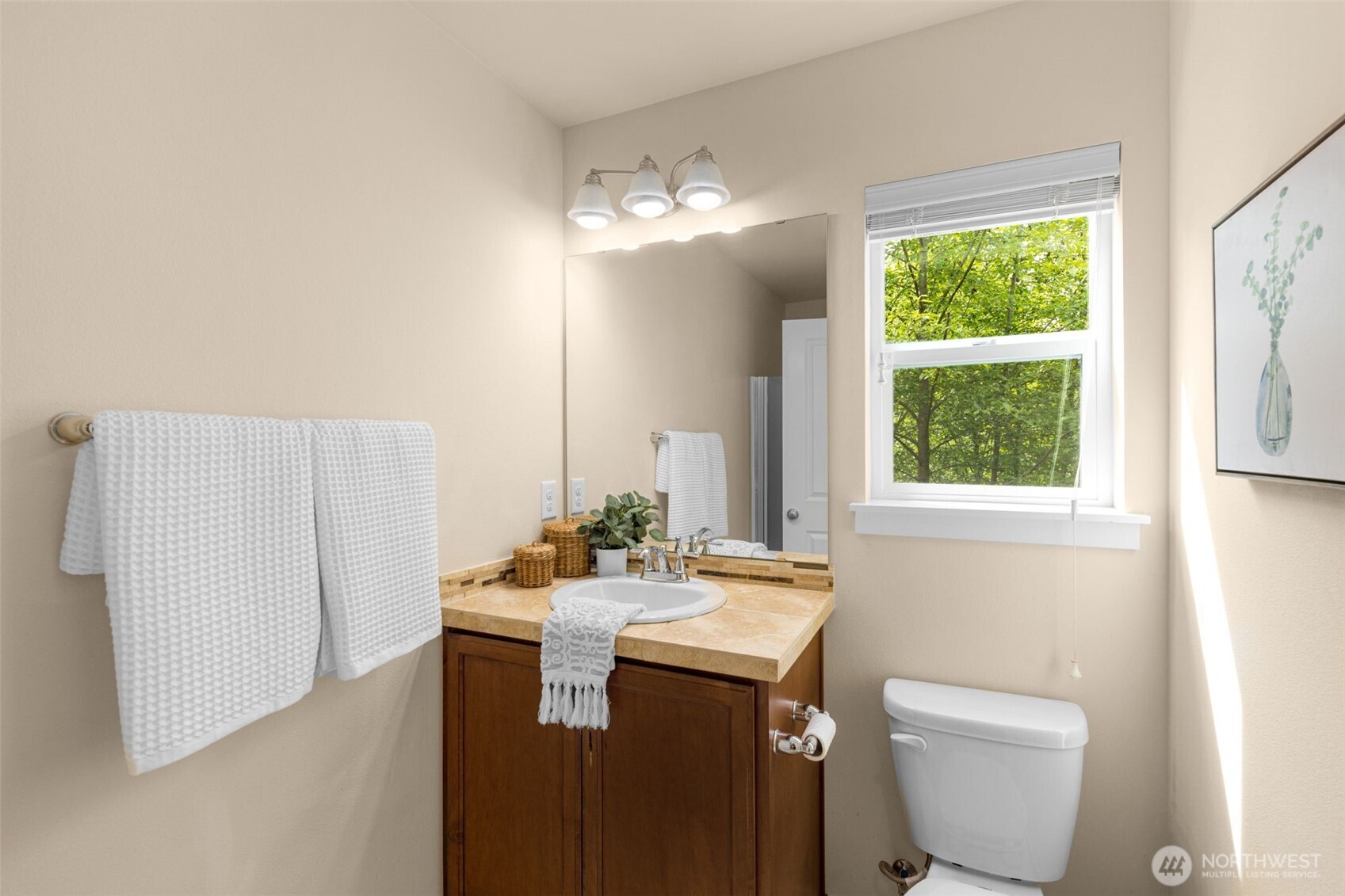 18525 115th Place Southeast Renton, WA 98055 - Photo 14 of 29 a bathroom with a sink toilet and a mirror