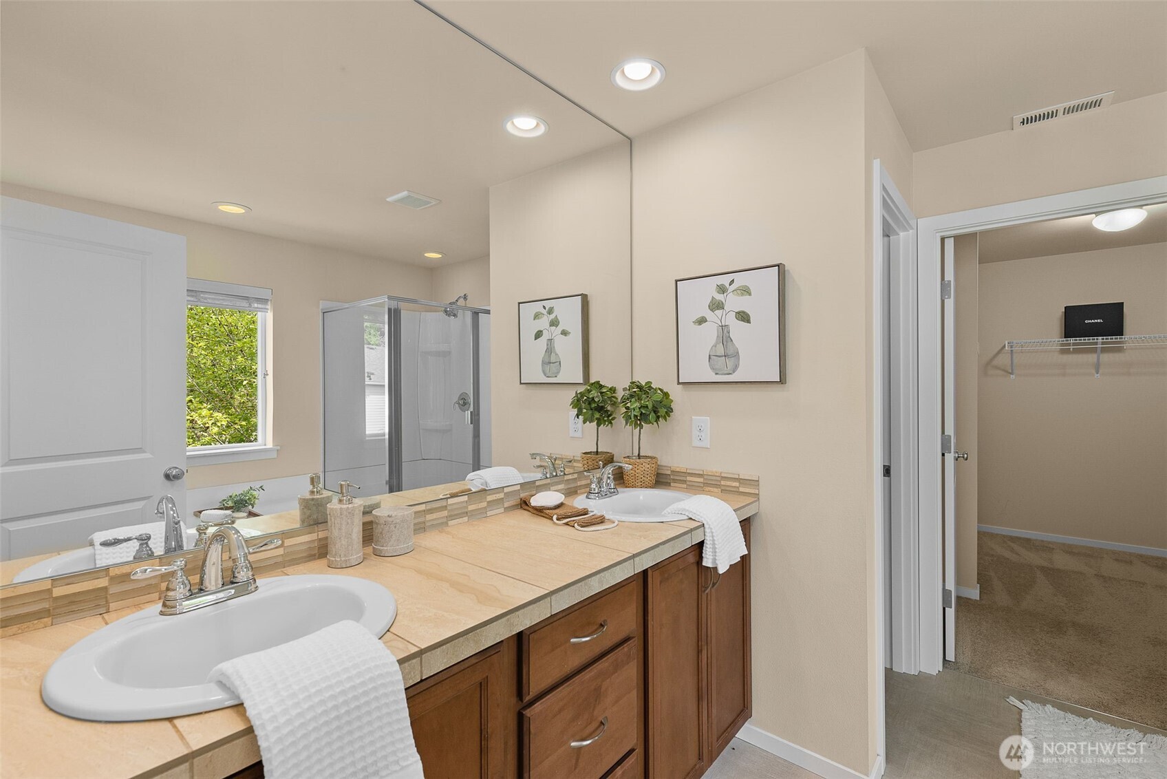 18525 115th Place Southeast Renton, WA 98055 - Photo 17 of 29 a bathroom with a sink double vanity and a mirror