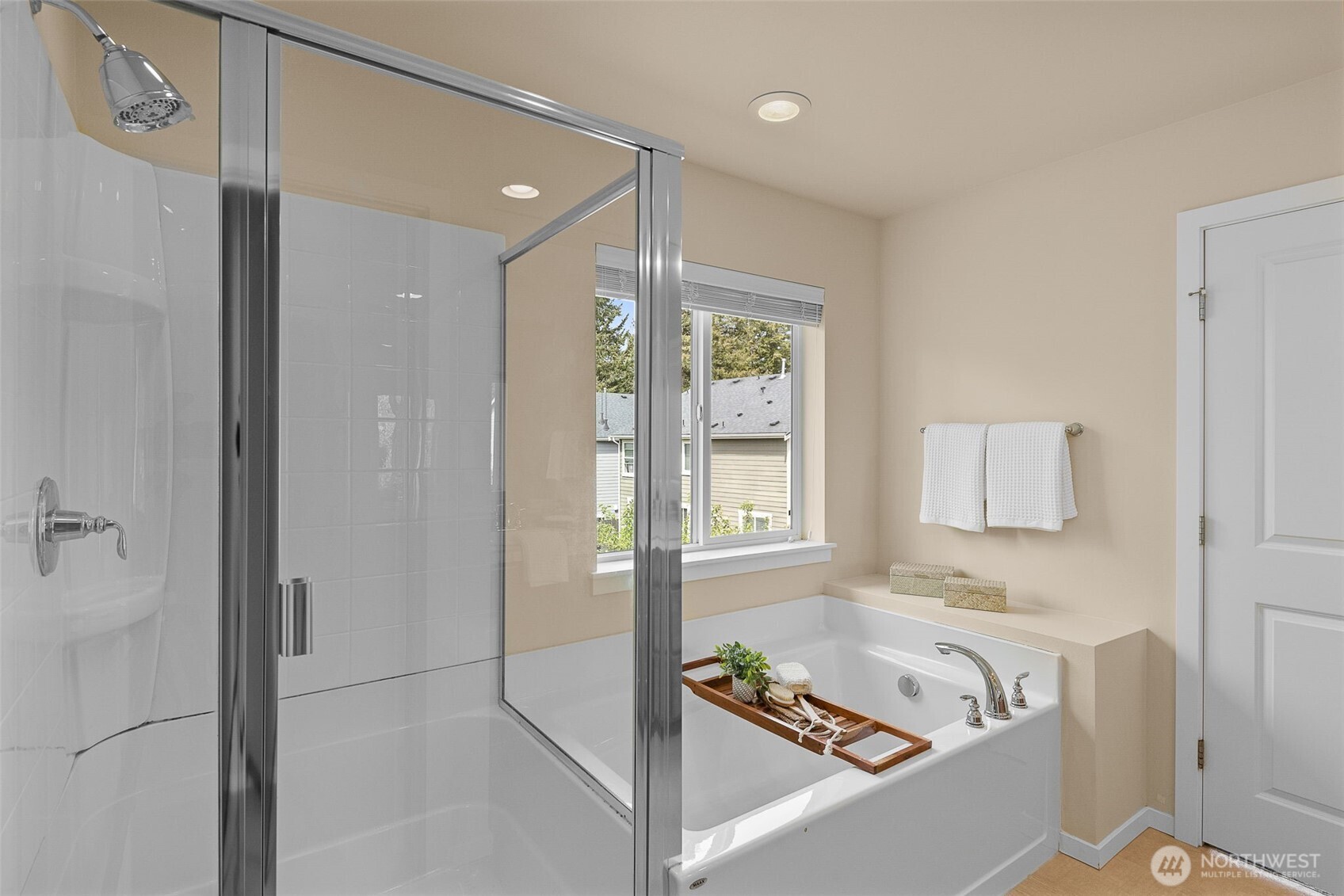 18525 115th Place Southeast Renton, WA 98055 - Photo 18 of 29 a bathroom with a tub shower and sink
