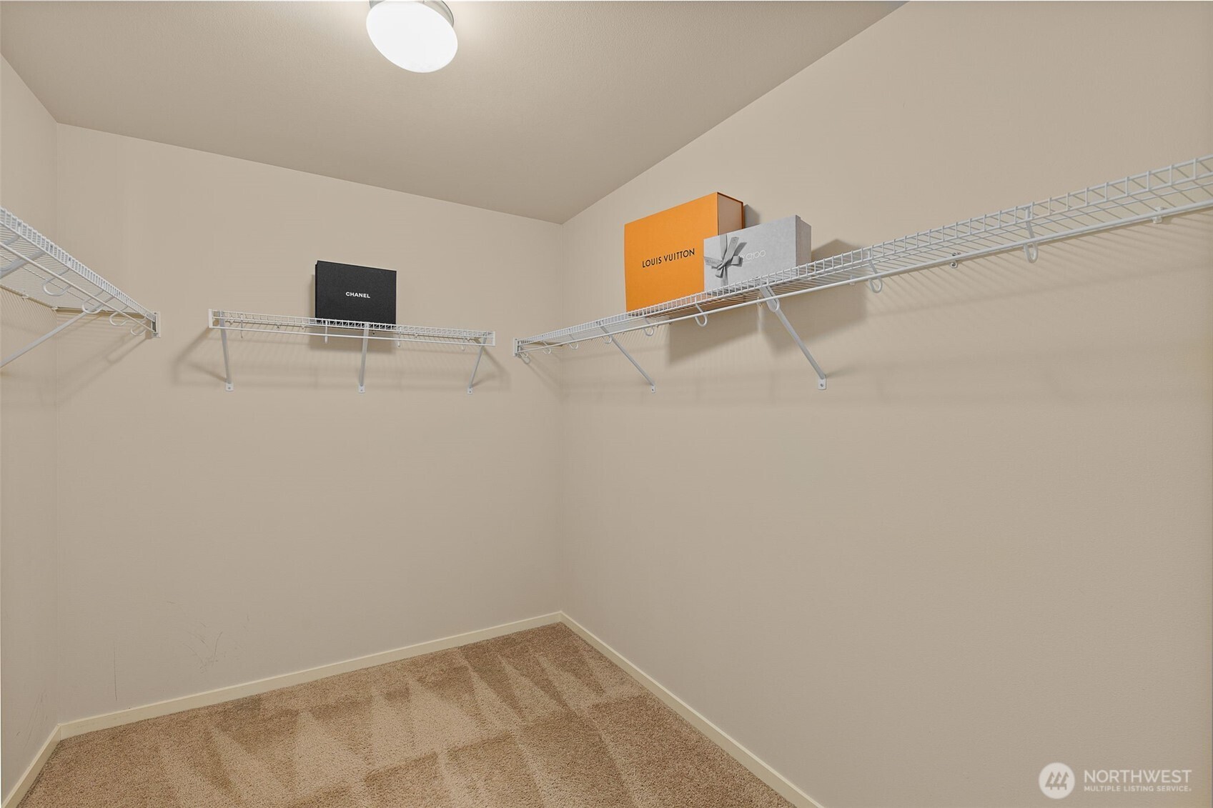 18525 115th Place Southeast Renton, WA 98055 - Photo 19 of 29 a view of a room with racks on the wall