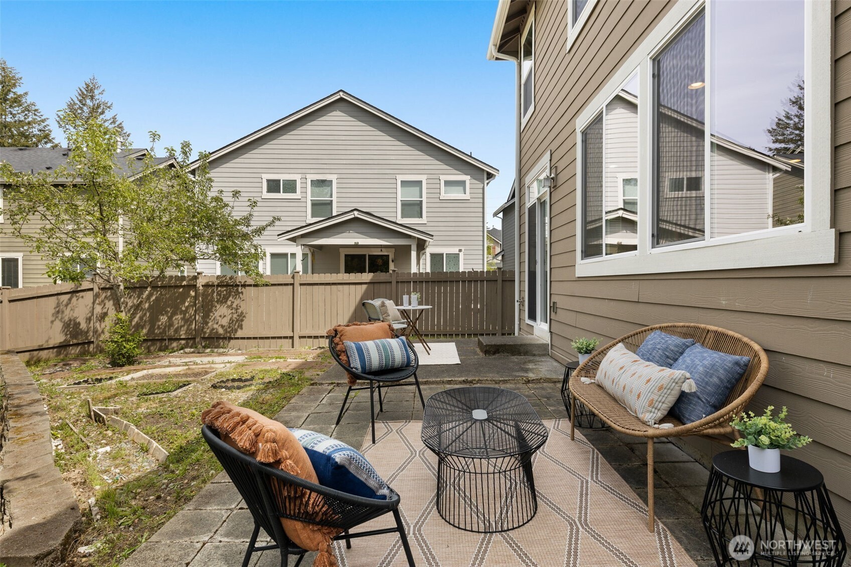 18525 115th Place Southeast Renton, WA 98055 - Photo 25 of 29 a front view of a house with patio outdoor seating
