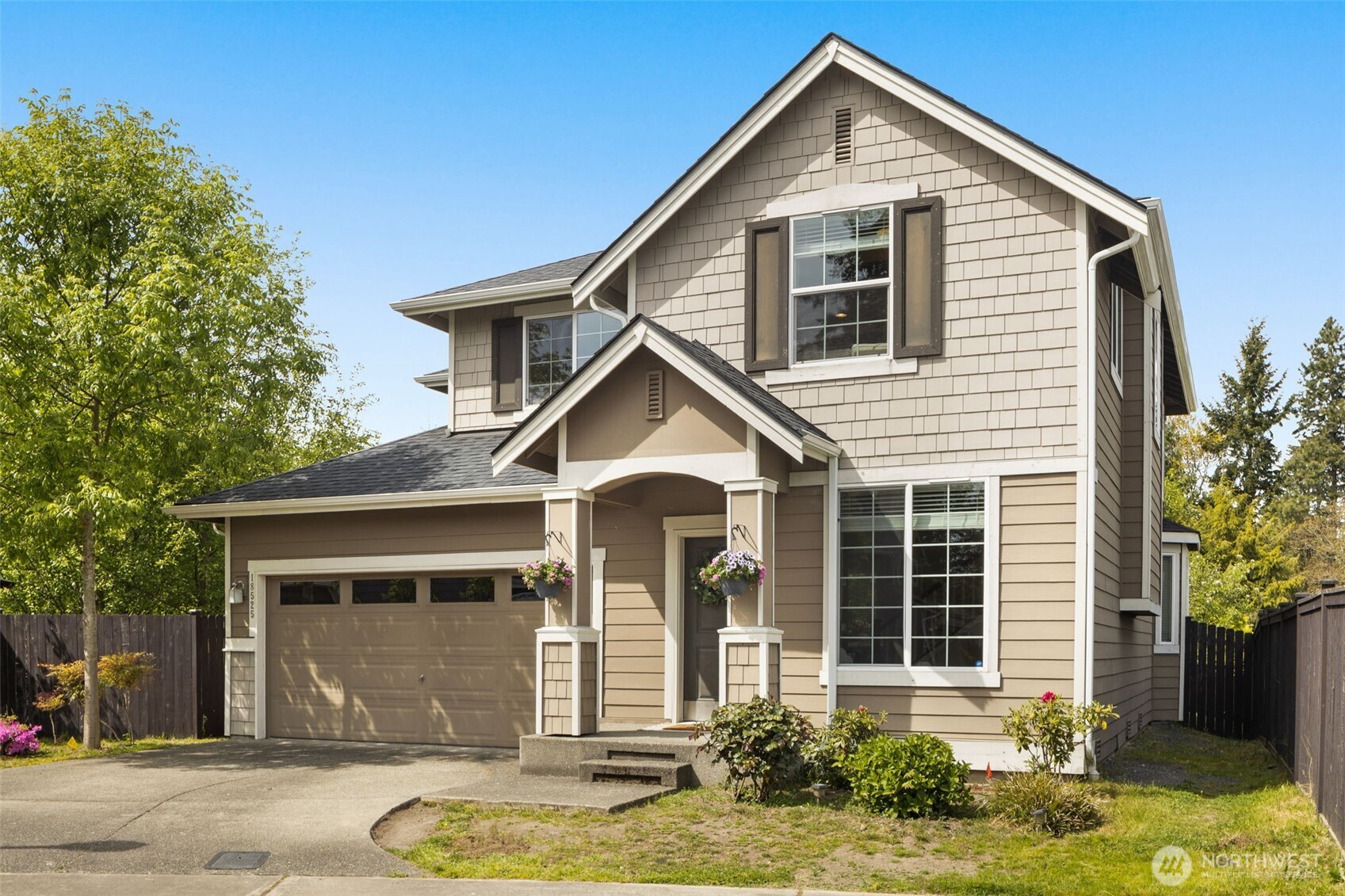 18525 115th Place Southeast Renton, WA 98055 - Photo 29 of 29 a front view of a house with a yard and garage