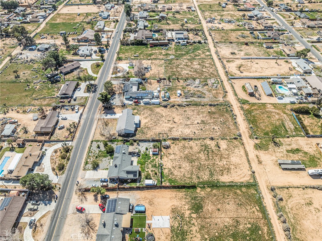 14266 Kiowa Road Apple Valley, CA 92307 - Photo 26 of 27 Aerial view of the block illustrating the expansive 1-acre properties and quiet desert surroundings.
