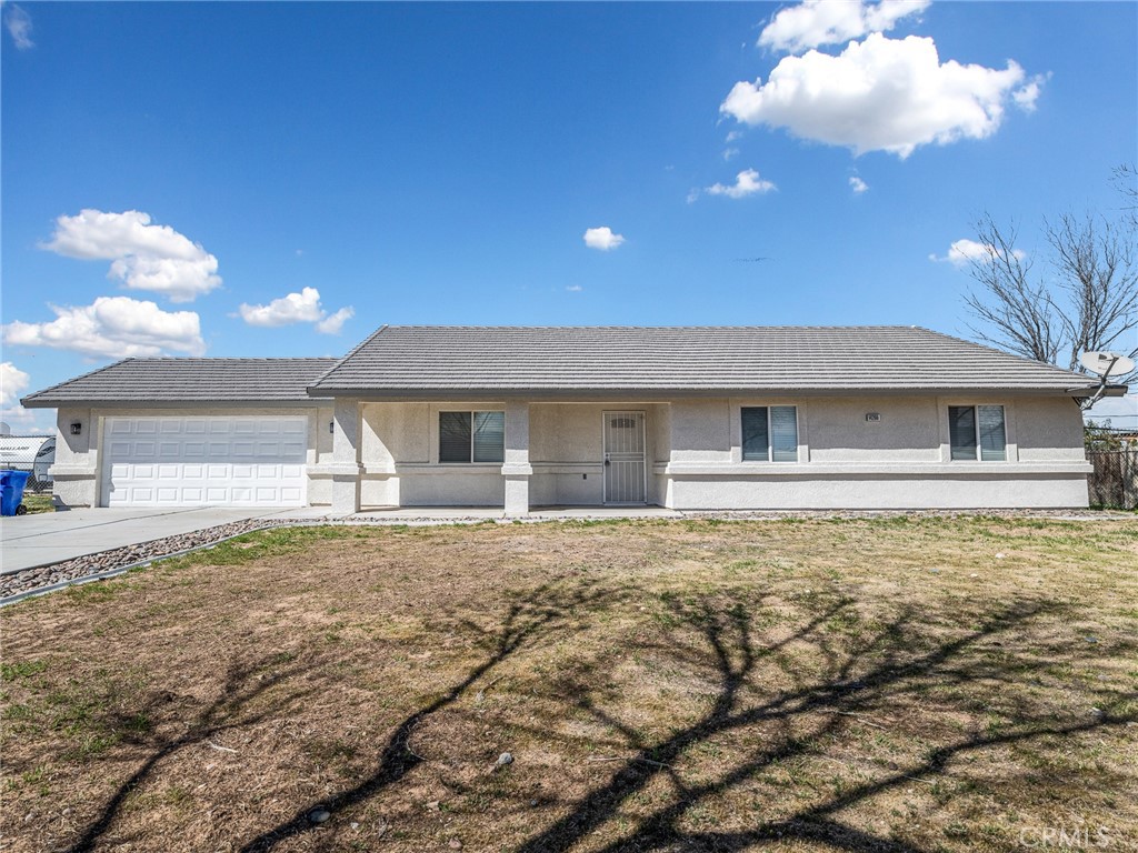 14266 Kiowa Road Apple Valley, CA 92307 - Photo 5 of 27 Clean curb appeal with a tile roof and expansive front yard.
