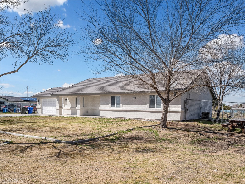 14266 Kiowa Road Apple Valley, CA 92307 - Photo 6 of 27 Experience the freedom of owning a full acre with room to breathe, park your RV, and enjoy the peaceful surroundings of Apple Valley Ranchos