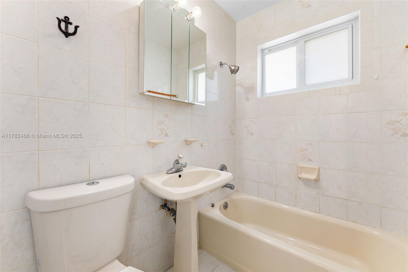 729 West 50th Place Hialeah, FL 33012 - Photo 17 of 45 1stBathroom-hallway