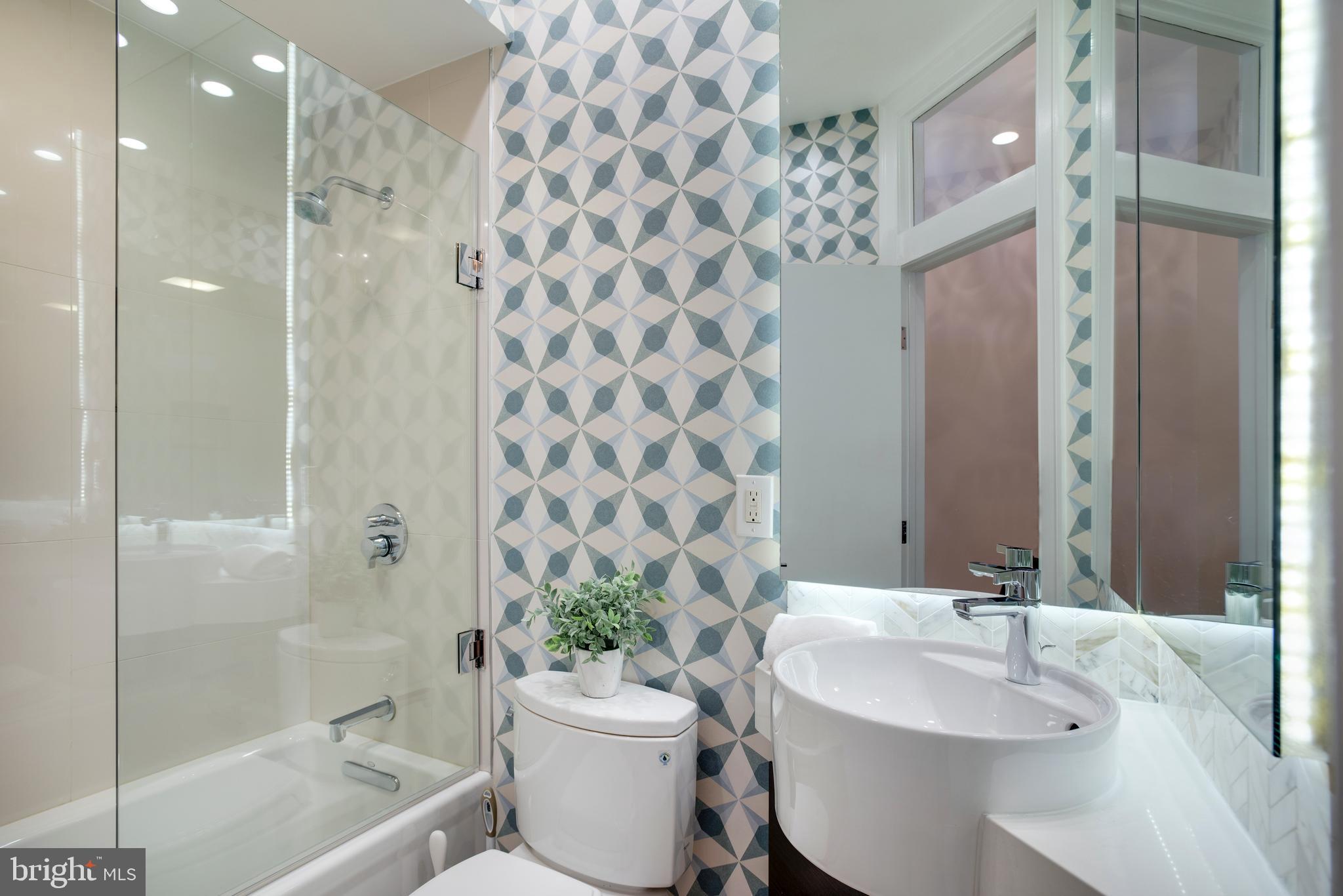 1515 P Street Northwest, Unit 3 Washington, DC 20005 - Photo 14 of 22 Full Hall Bathroom w Christiana cabinetry