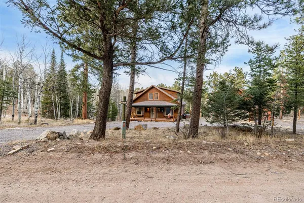 a house with trees in front of it