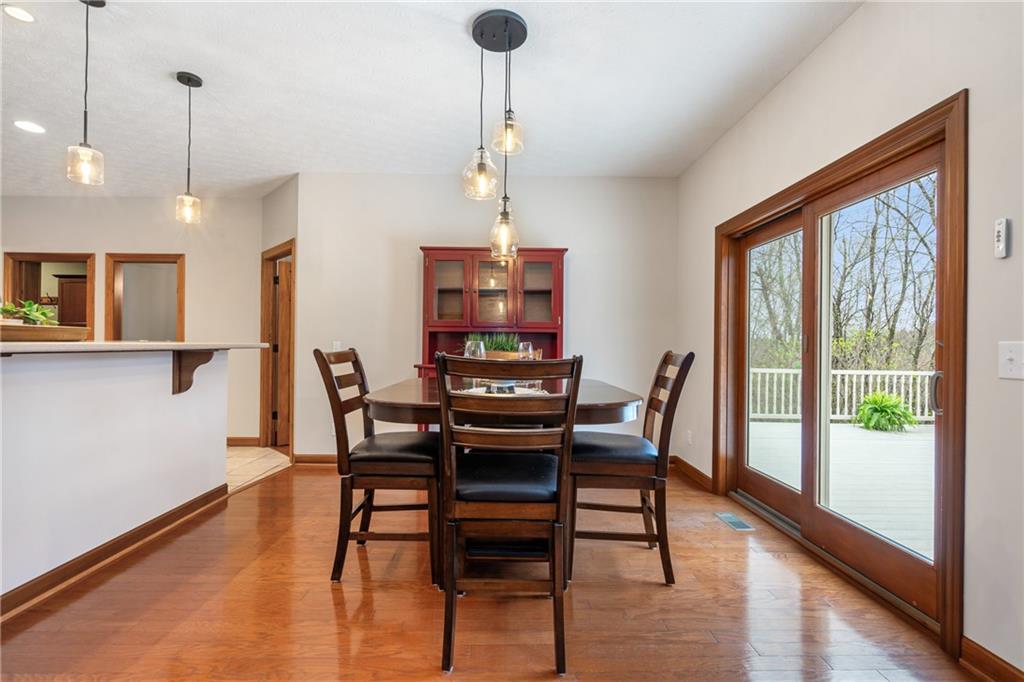 4275 Burtner Road Natrona Heights, PA 15065 - Photo 9 of 42 a view of a dining room with furniture window and wooden floor