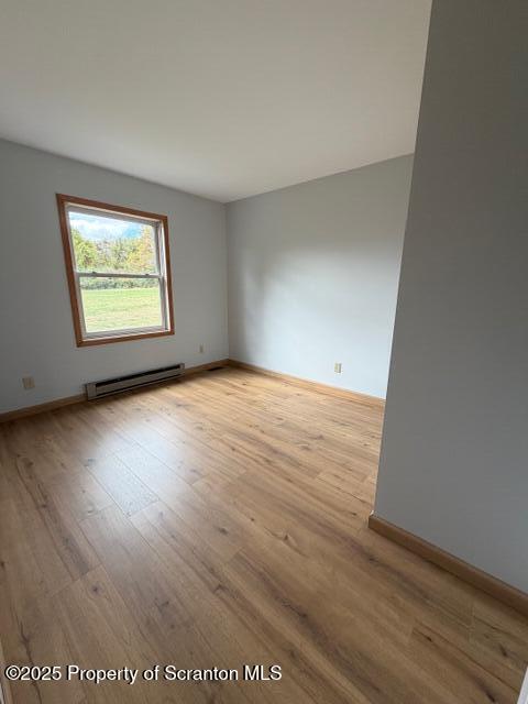 2743 River Road Wysox, PA 18854 - Photo 11 of 32 an empty room with wooden floor and windows