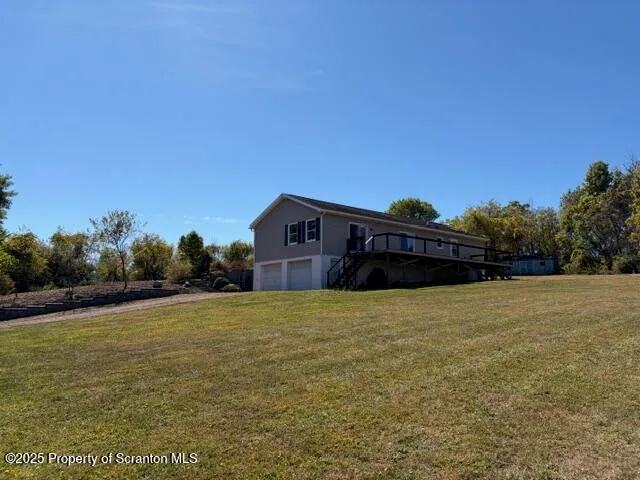 a house with trees in the background