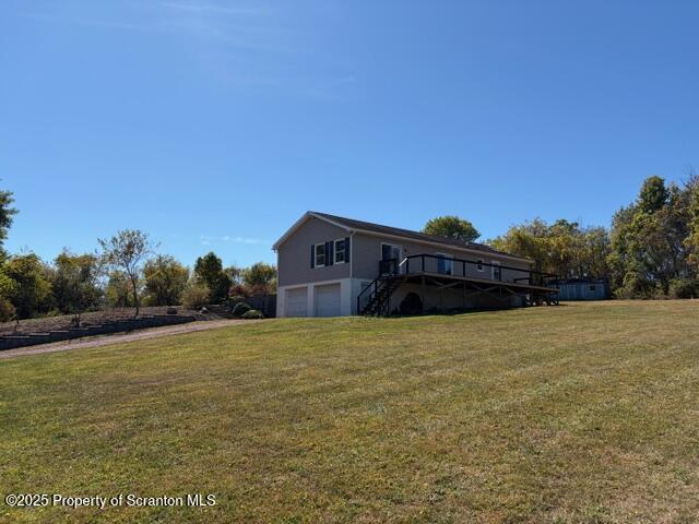 2743 River Road Wysox, PA 18854 - Photo 3 of 32 a house with trees in the background