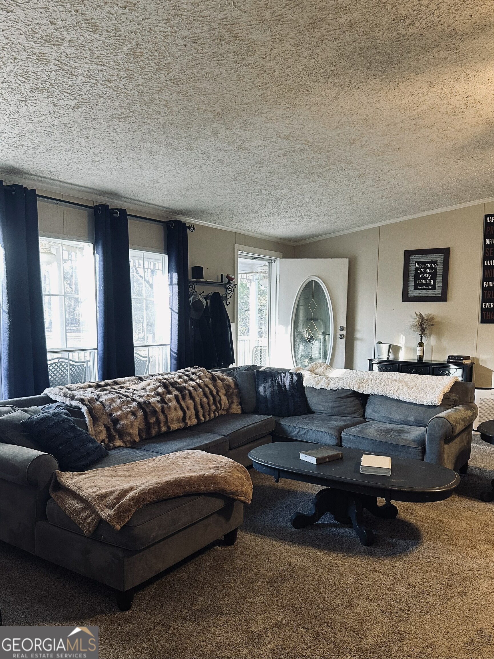 6675 Millwood Road, Unit 1B Gainesville, GA 30506 - Photo 4 of 10 a living room with furniture