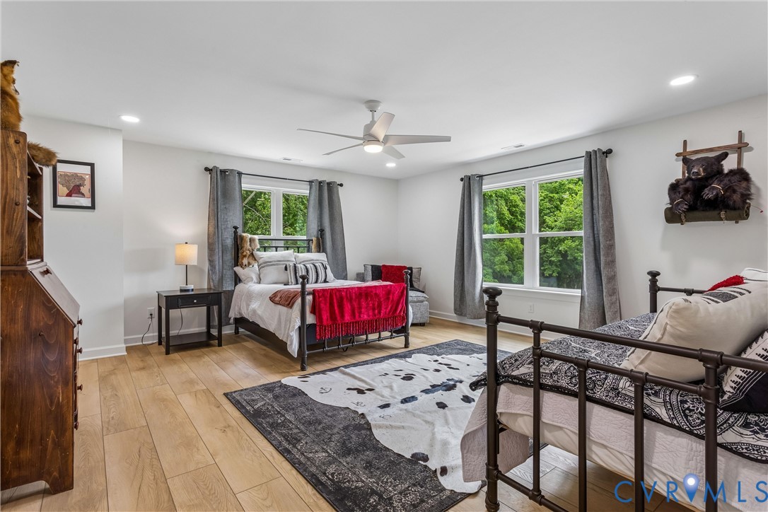 2016 Forge Road Toano, VA 23168 - Photo 72 of 99 Spacious bedroom featuring wood-finish flooring, r