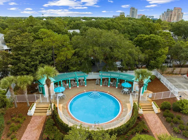 an aerial view of a swimming pool and outdoor space
