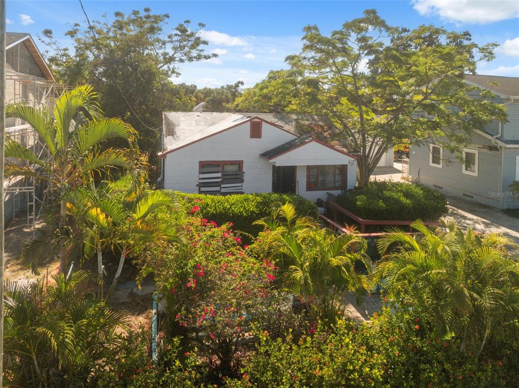 1916 West Grace Street Tampa, FL 33607 - Photo 13 of 26 a front view of a house with a yard and garage