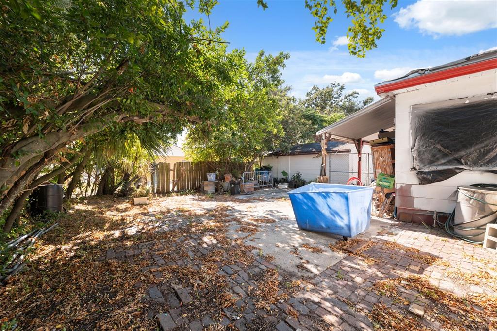 1916 West Grace Street Tampa, FL 33607 - Photo 8 of 26 a view of a house with a backyard