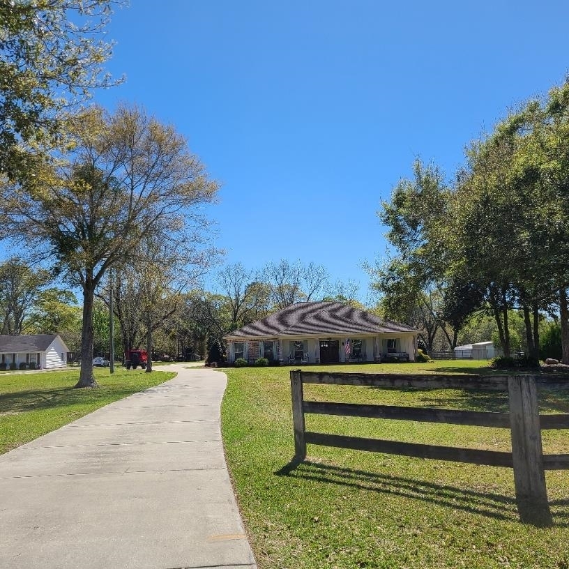 10051 Blackwell Nursery Road Semmes, AL 36575 - Photo 1 of 54 Ranch-style house featuring driveway
