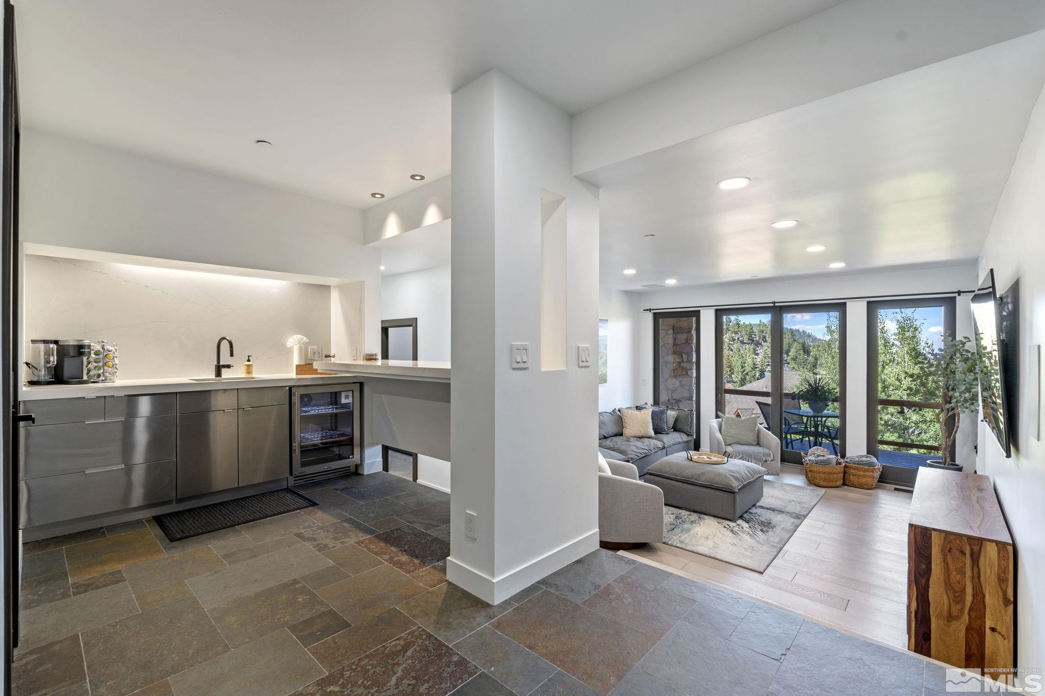 1625 Black Bear Run Stateline, NV 89449 - Photo 15 of 20 a living room with furniture with a large window