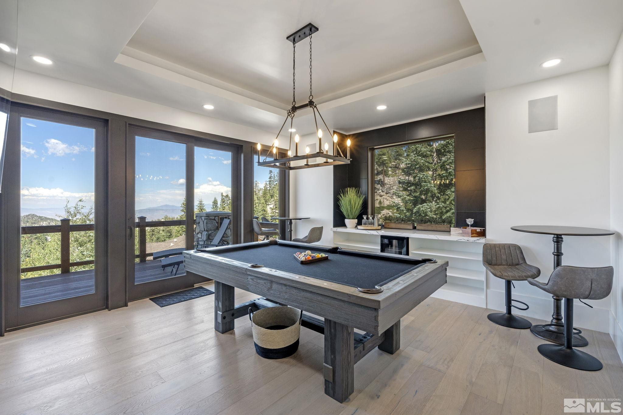 1625 Black Bear Run Stateline, NV 89449 - Photo 5 of 20 a view of a dining room with furniture window and outside view
