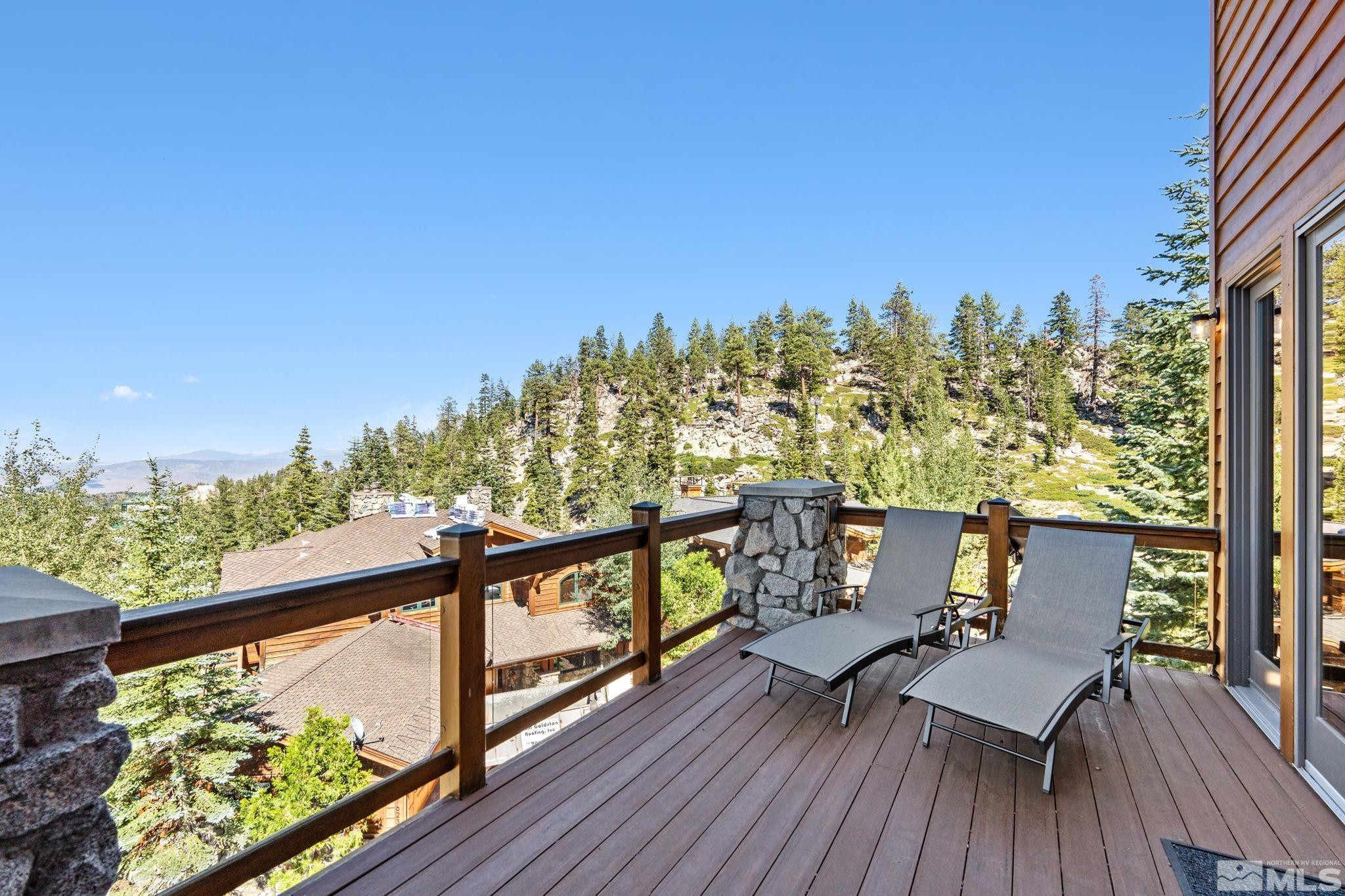 1625 Black Bear Run Stateline, NV 89449 - Photo 9 of 20 a view of a chairs and table on the wooden floor