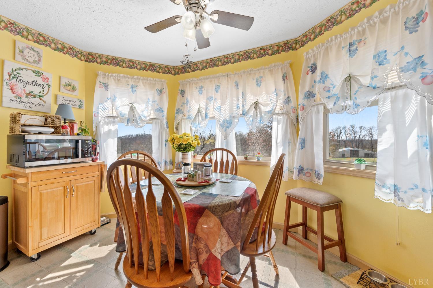 1925 Forbes Mill Road Bedford, VA 24523 - Photo 21 of 58 a dining room with furniture and window