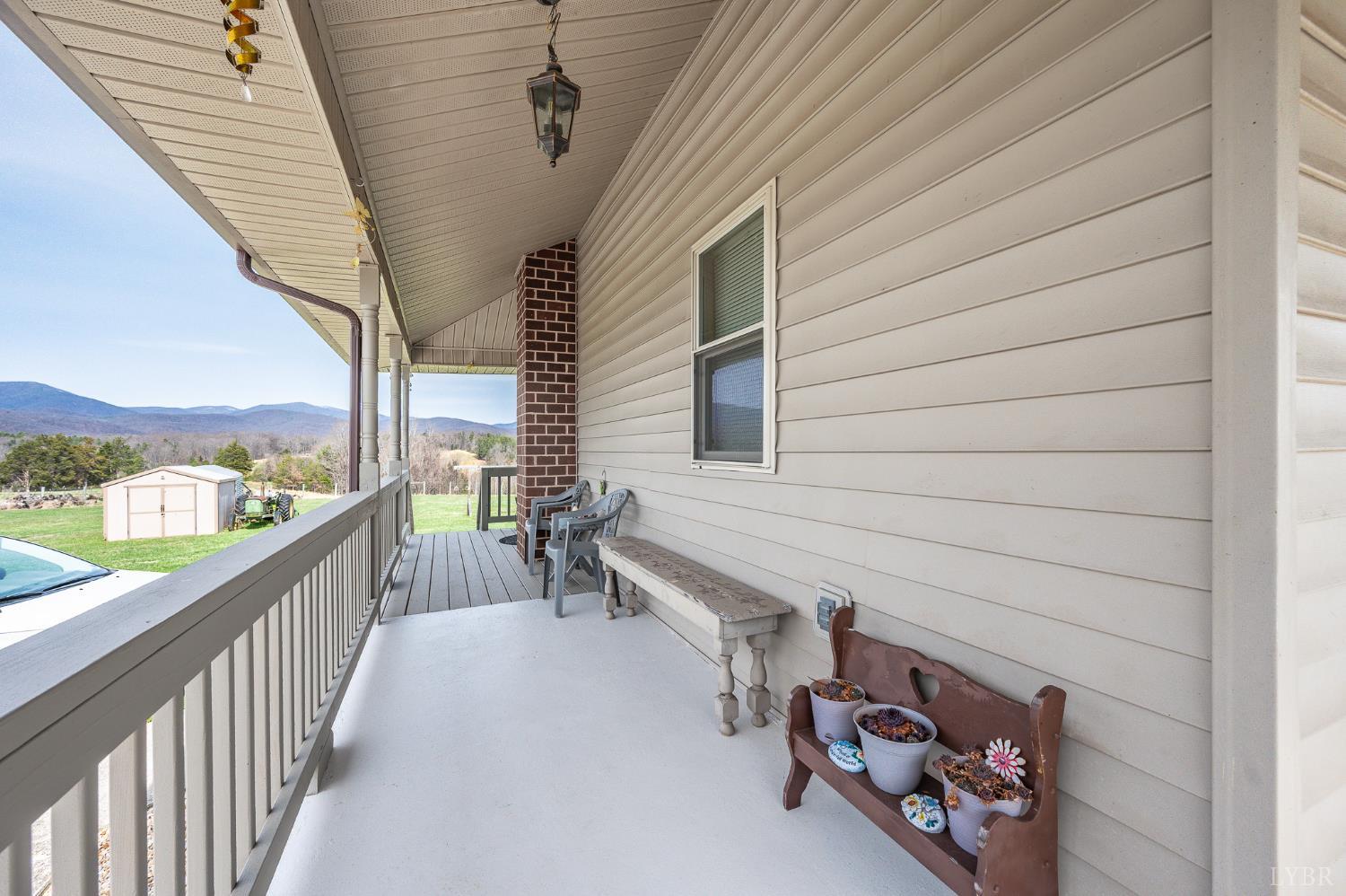 1925 Forbes Mill Road Bedford, VA 24523 - Photo 44 of 58 a view of a porch with furniture