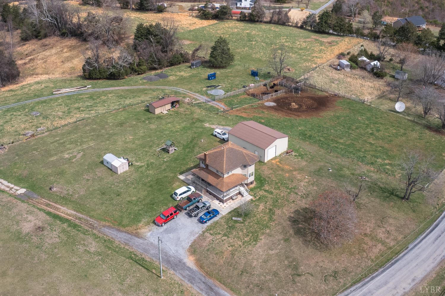 1925 Forbes Mill Road Bedford, VA 24523 - Photo 5 of 58 an aerial view of a house with a yard
